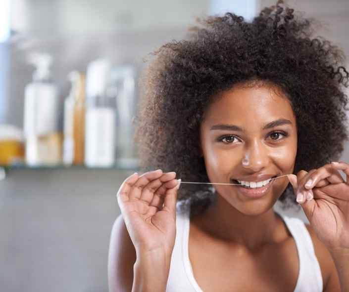 Brushing and flossing with Invisalign