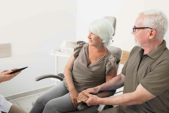 Senior discussing CDCP dental coverage at a North York dental clinic