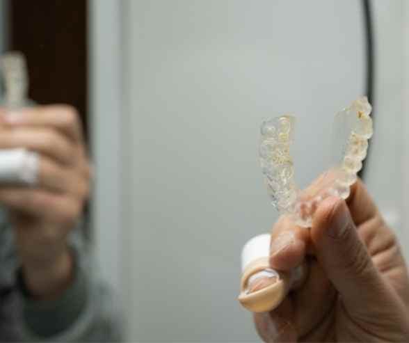 Stained Invisalign aligners from vaping residue