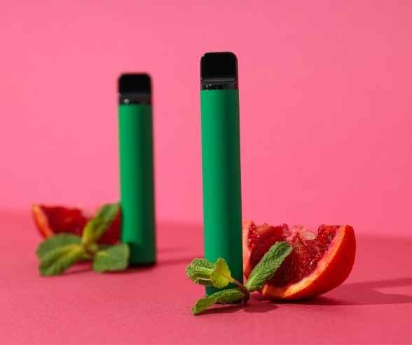 Modern vaping devices beside Invisalign aligners